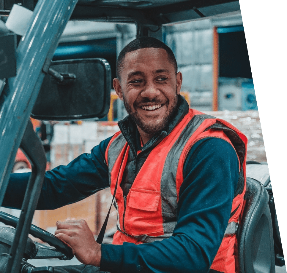 Black Man driving forklift Hunter Express Wear House